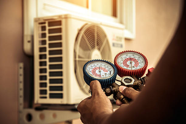 Professional Hvac Maintenance technician working in Show Low, AZ